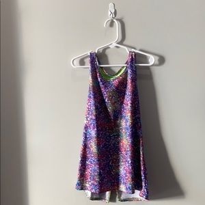 It is colorful and it is a Athletic shirt for kids